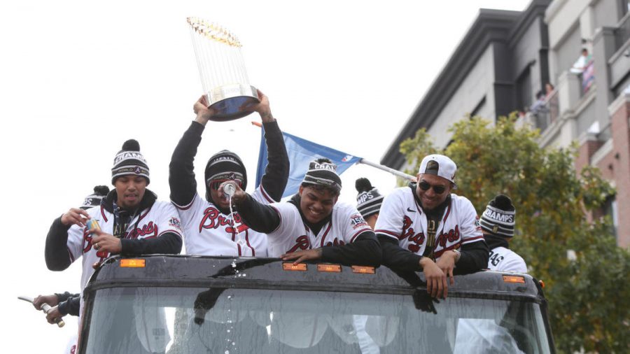 Nov+5%2C+2021%3B+Atlanta%2C+GA%2C+USA%3B+Atlanta+Braves+players+celebrate+with+a+flag+and+the+Commissioners+Trophy+during+the+World+Series+championship+parade+at+Truist+Park.+Mandatory+Credit%3A+Brett+Davis-USA+TODAY+Sports