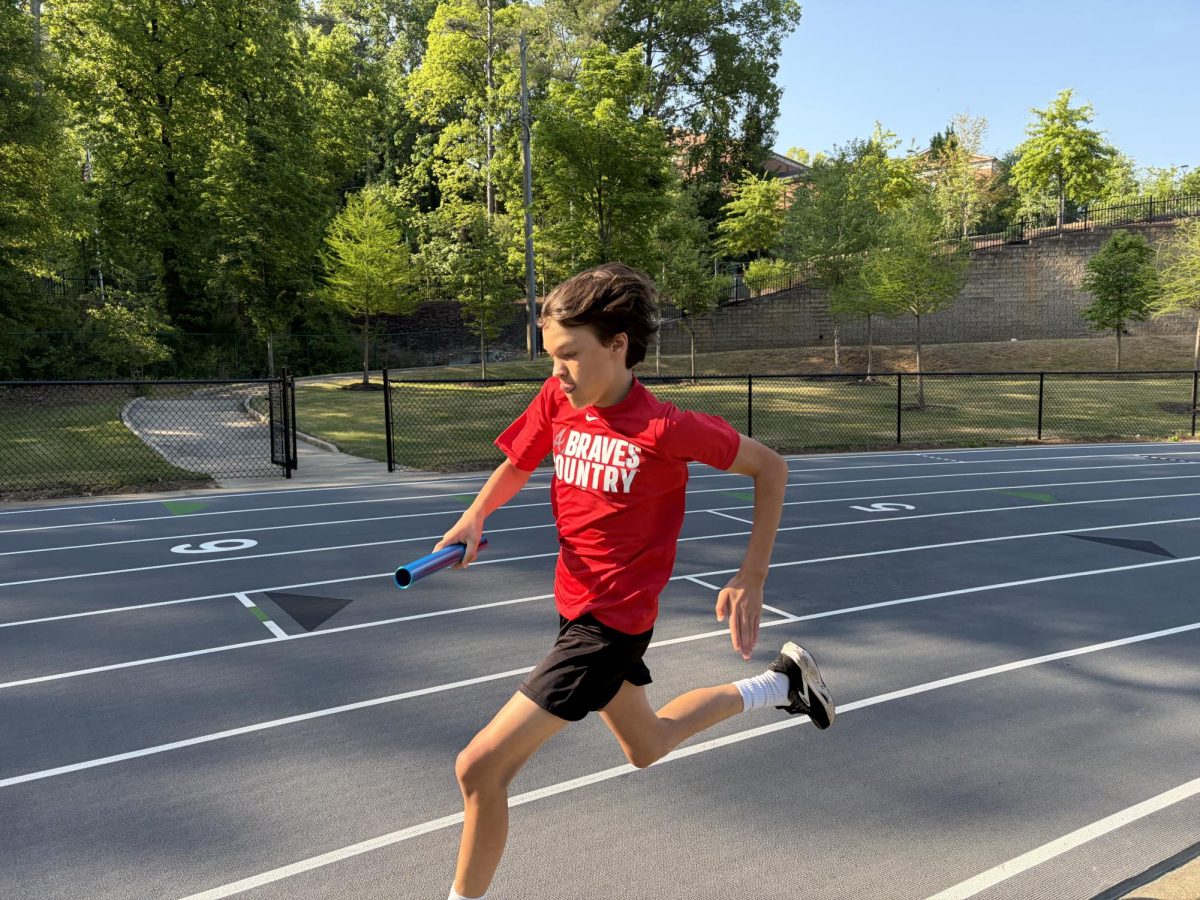 Parks Stone coming around the opening curve in the 4x100.